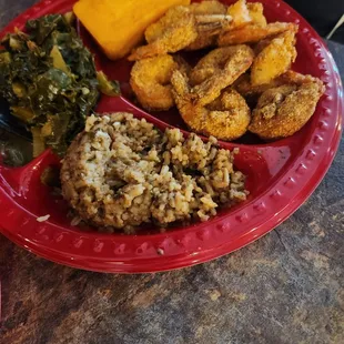 Fried shrimp dirty rice collard greens and corn bread
