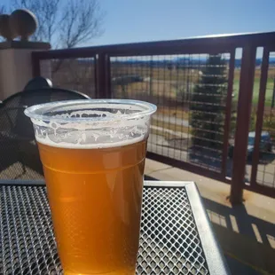 Palisades Peach while soaking up the sun &amp; watching golfers. Only $7 for a 24oz.