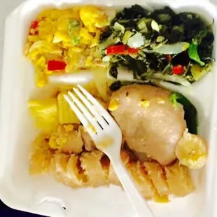 Ackee &amp; salt fish with calallou boiled dumplings and green bananas.