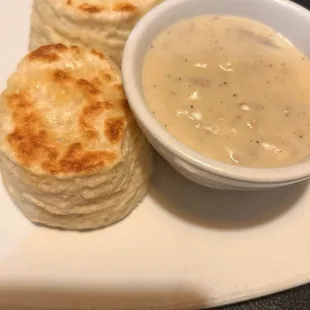 Biscuits and gravy. My husband got his gravy for the meat lovers hometown the side and got biscuits instead of toast.