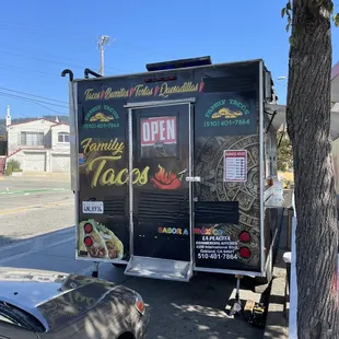 a food truck parked on the side of the road