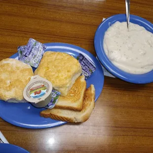 Biscuits and a bowl of sausage gravy