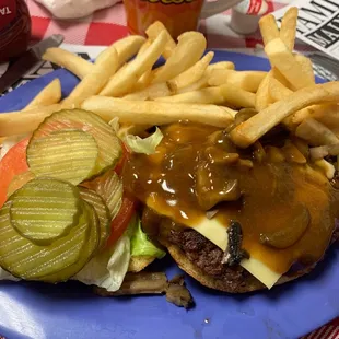Mushroom swiss burger with extra fries and cole slow ($5.65 + $2.99)