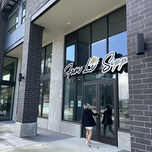 a woman entering a building