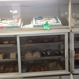 a display of cakes and pastries