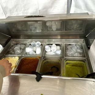 2 on Left side salsas are spicy. 2 on the right are mild and medium. Best one is the middle salsa verde