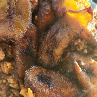 Side of plantain and side and jollof rice =$9