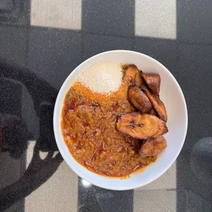 Ripe Plantains, Garri with Bean Stew