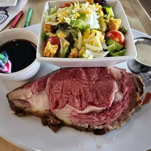 Prime rib with au jus and salad