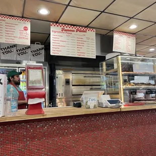 Menu of signature pizza by the slice.