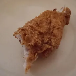 a piece of fried chicken on a plate
