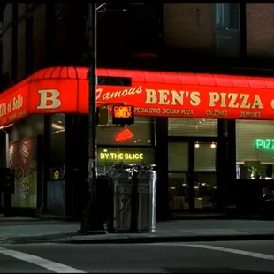 a restaurant on the corner of a street