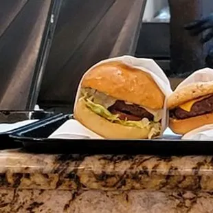 a man preparing burgers
