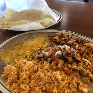 Chorizo and Eggs, Rice, Beans Flour Tortillas Breakfast .