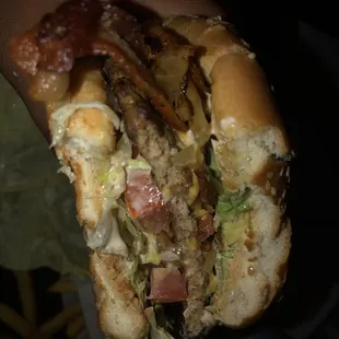 Avocado bacon cheeseburger