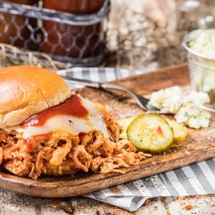 a pulled pork sandwich with coleslaw