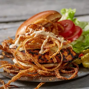 ows grilled chicken sandwich with onion rings
