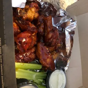 a box of wings and celery