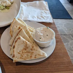 Pita with hummus spread