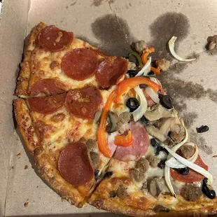 Half pepperoni half supreme.Good pizza.