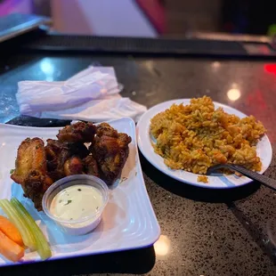 Wings and jollof rice