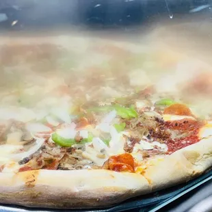 a pizza being cooked