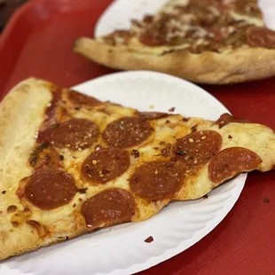 two slices of pepperoni pizza