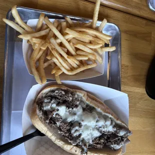 a plate of fries and a sandwich