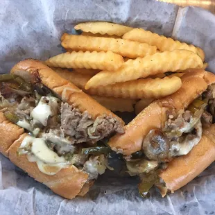 &quot;The Works&quot; cheesesteak, 8&quot; with fries.