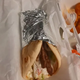 a sandwich wrapped in foil