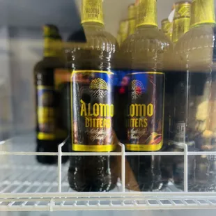 a fridge full of alcoholic beverages