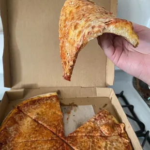 Sloppy undercooked pizza