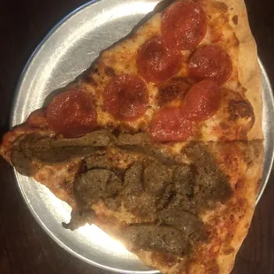 One slide pepperoni one slice sausage.