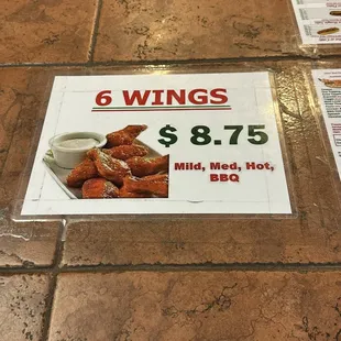 a sign for wings