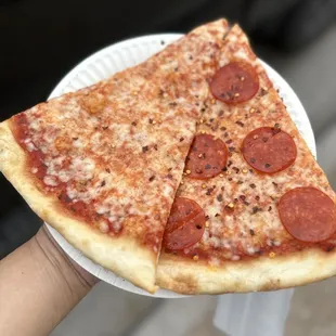 a slice of pepperoni pizza