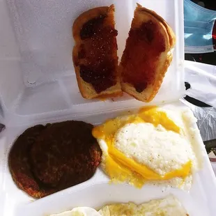 two eggs and a sausage sandwich
