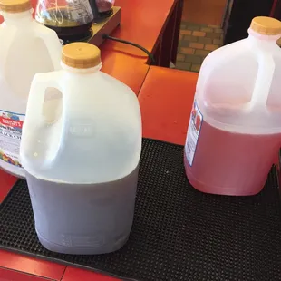 Jugs of limeade and sweet tea