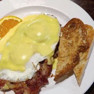 Famous Hash, eggs with hollandaise sauce and sour dough toast