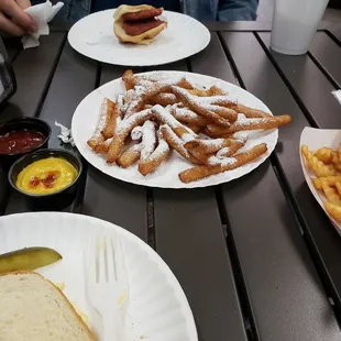 FUNNEL CAKE FRIES ! half egg salad on white and a smoke sausage in the fore and background!