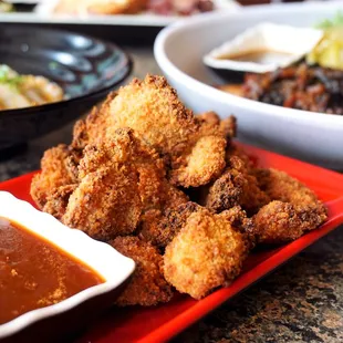 Spicy Chicken Bites (劲辣鸡块): chicken thigh diced and panko breaded before deep fried ($8.75).