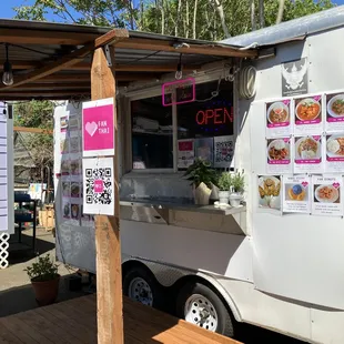 a food truck parked in a parking lot