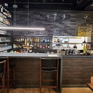 Bar area of Forty Nine Forty restaurant next door in same building.