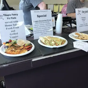 Daily specials are advertised on the counter by the register