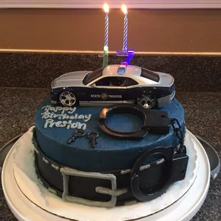 Everything u see (except belt) I added onto this cake with candles lit