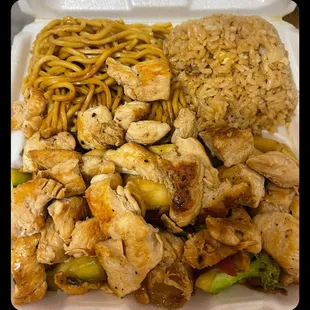 chicken and rice in a styrofoam container