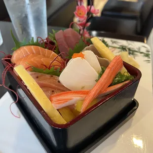 Chirashi (assortment of raw and cooked items) over a bed of rice