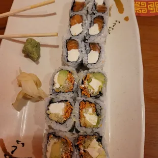 Salmon roll and a veggie roll