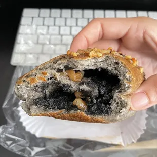 Lots of black sesame paste and walnuts in this bun. Yum