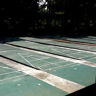 Shuffleboard. I kinda of want to learn it. You'd think hispters ould be all over this is be...snicker...ironic.