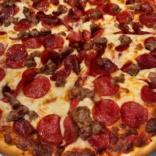 Extra cheese &amp; sauce with pepperoni and sausage